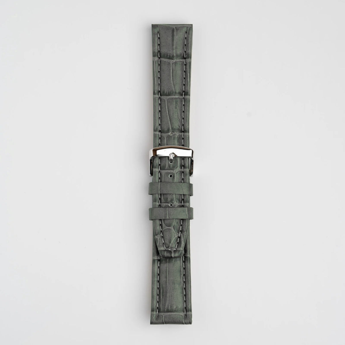 Grey padded alligator grain leather watch strap, buckled, front view