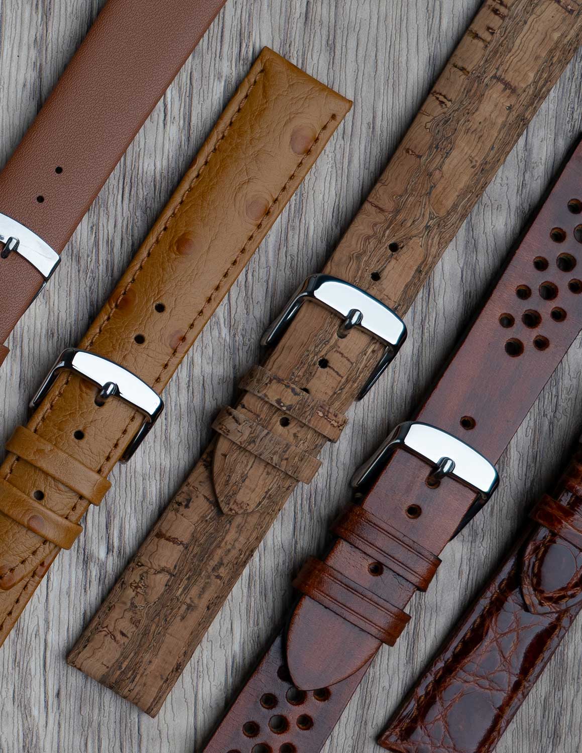 A selection of tan / light brown watch straps showing the different grains of leather and styles.