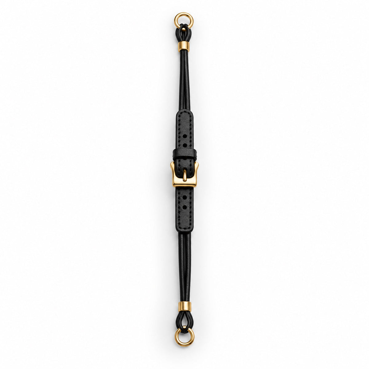 A black leather cordette watch strap with gold-tone hardware, including a buckle, rings, and loop, shown vertically on a plain white background.