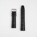 Black Mayfair Contour watch strap, laid flat with its buckle