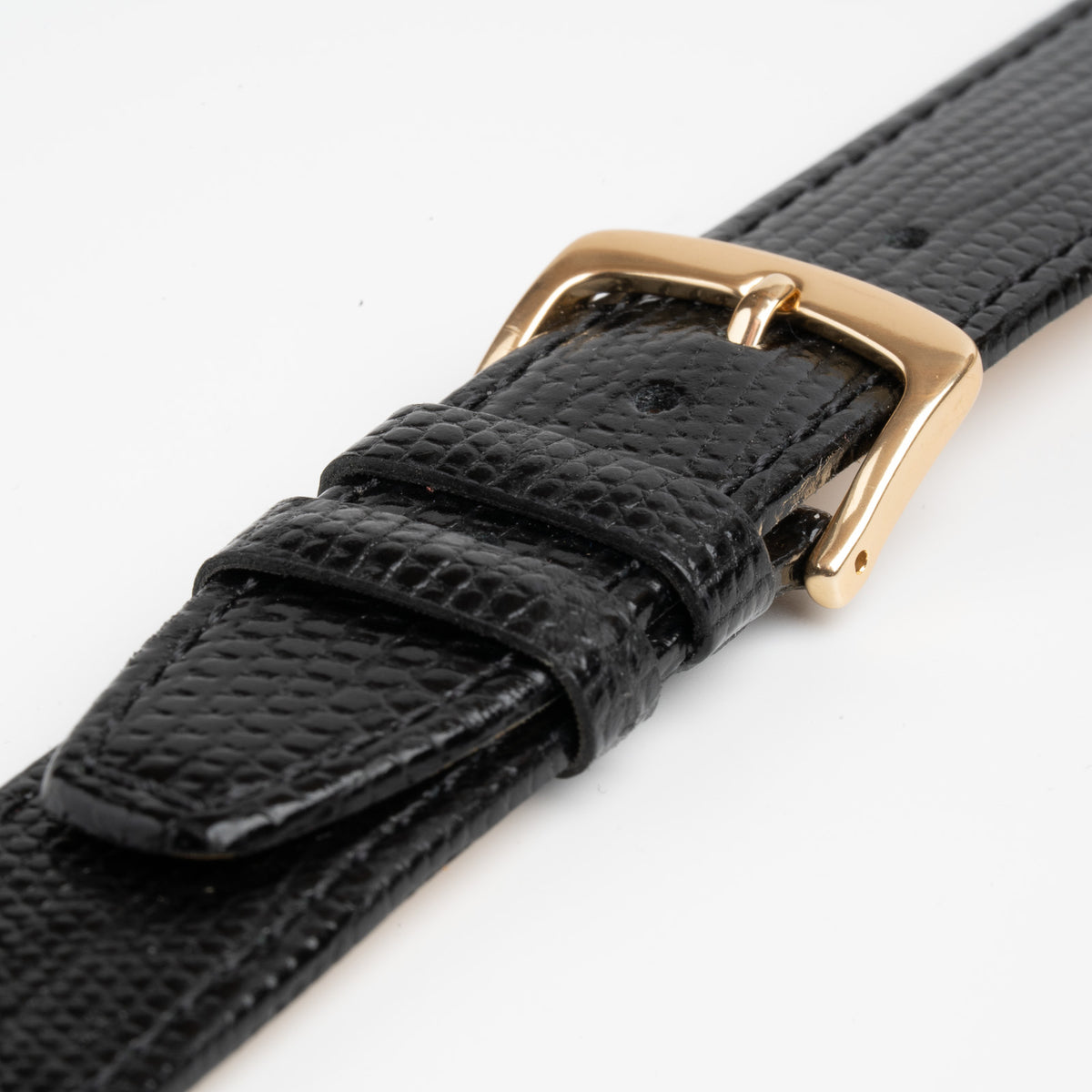 Teju Lizard Black Watch Strap, close-up of the buckle and keepers