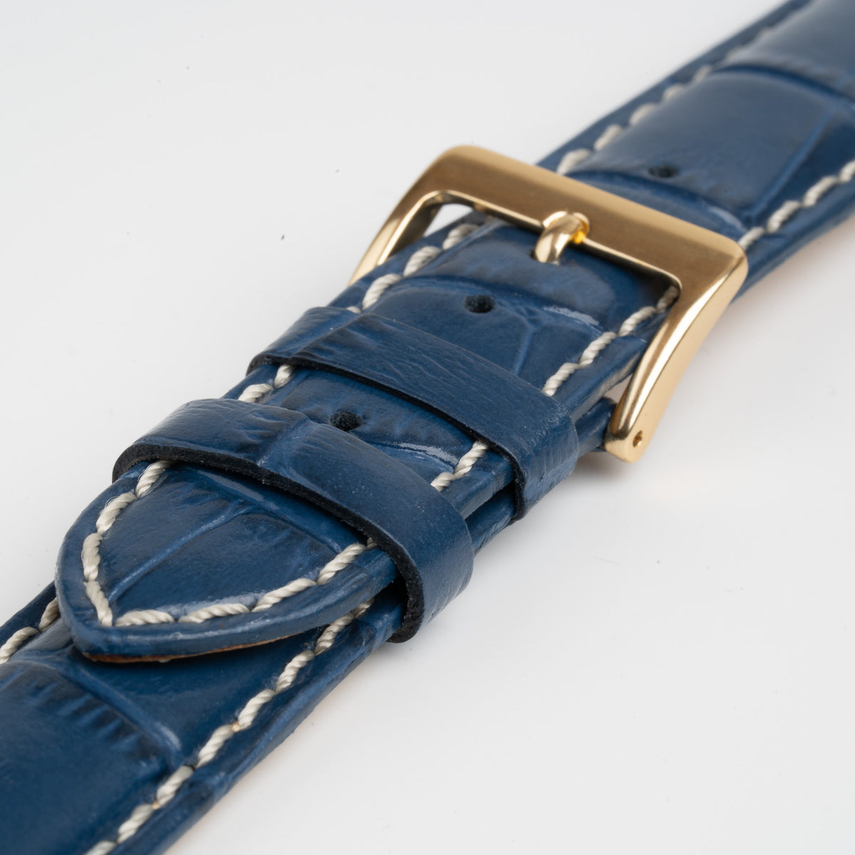 Blue Mayfair Classic watch strap, close-up of the buckle and keepers