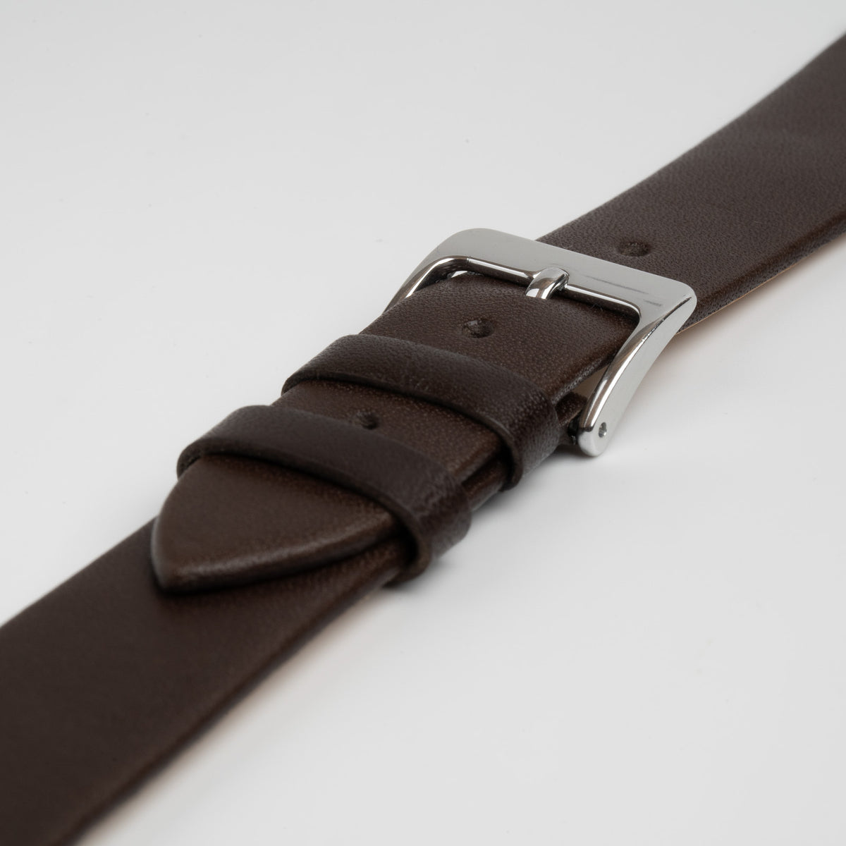 Taper Brown Watch Strap, close-up of the buckle and keepers