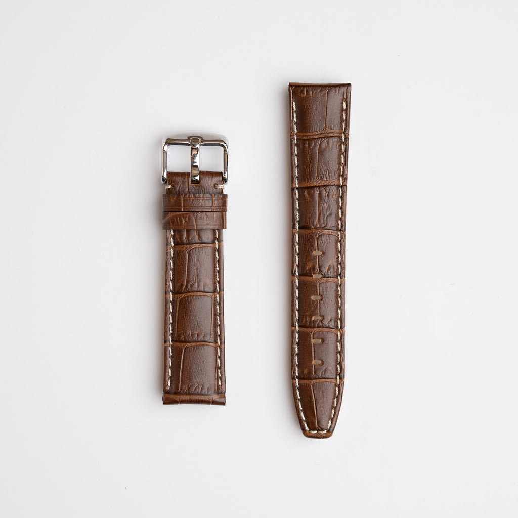 Brown Mayfair Alligator watch strap, laid flat with its buckle