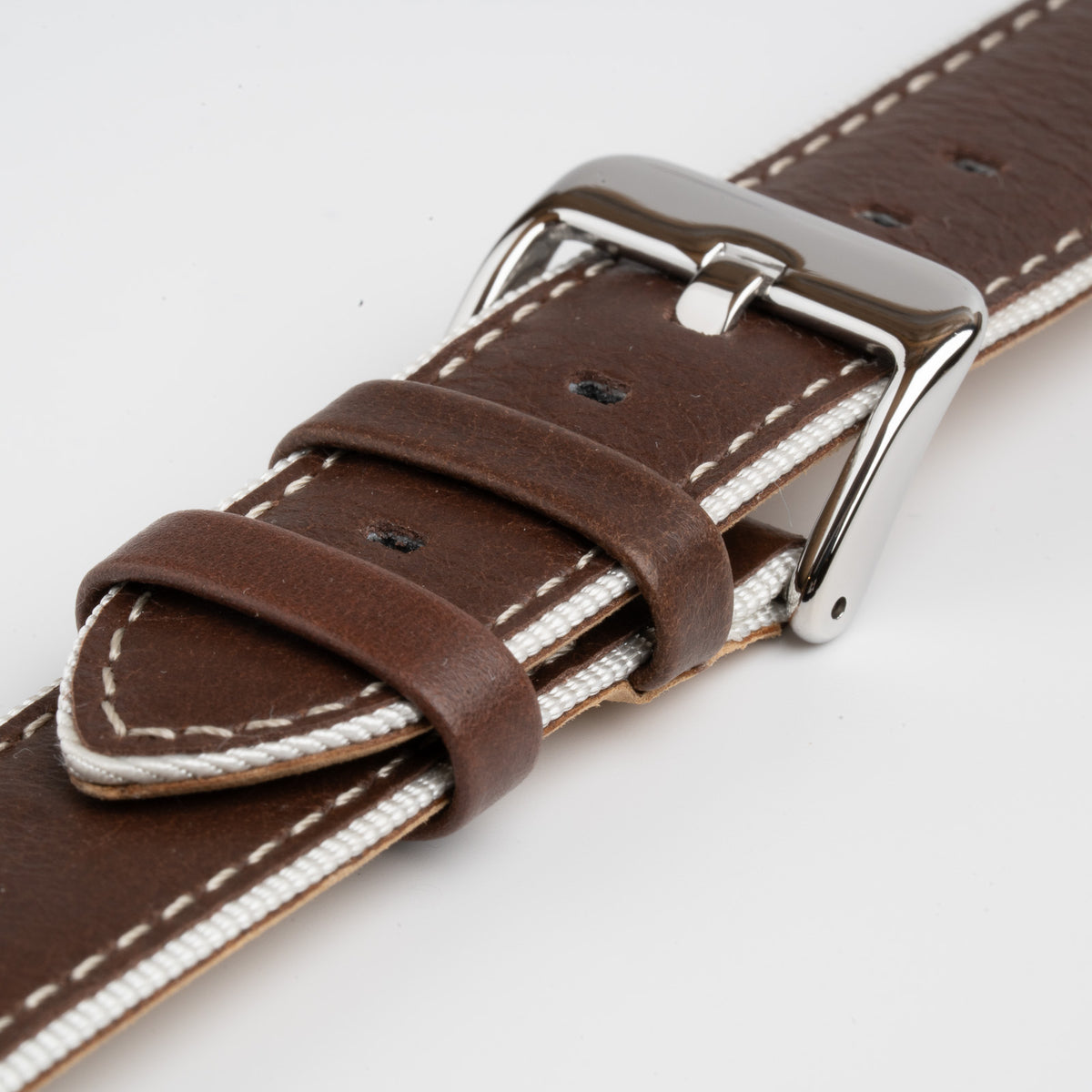 Brown Mayfair Nylon Edge watch strap, close-up of the buckle and keepers