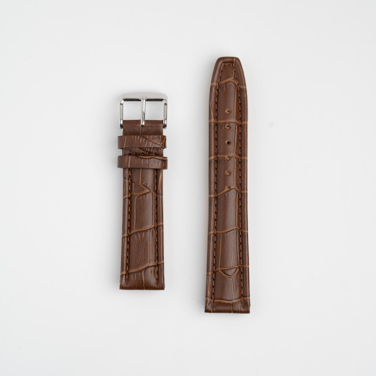 Brown Mayfair Contour watch strap, laid flat with its buckle