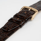Patent Crocodile Brown Watch Strap, close-up of the buckle and keepers
