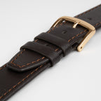 Water Resistant Stitched Brown Watch Strap, close-up of the buckle and keepers