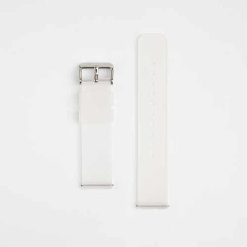 A clear silicone watch strap with a silver buckle, laid out flat against a white background.
