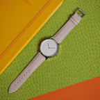 Mimic Eminence Quick Release Cream Watch Strap, shown on a watch