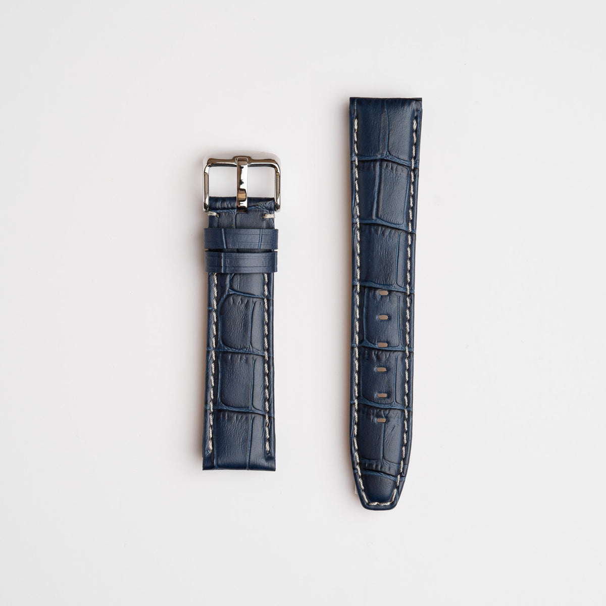 Dark Blue Mayfair Alligator watch strap, laid flat with its buckle