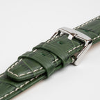 Green Mayfair Alligator watch strap, close-up of the buckle and keepers