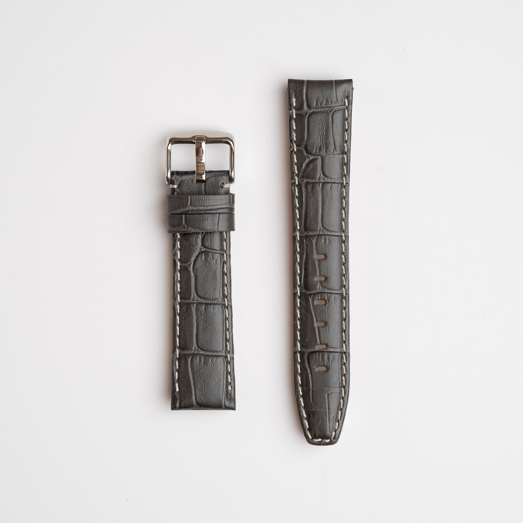 Grey Mayfair Alligator watch strap, laid flat with its buckle