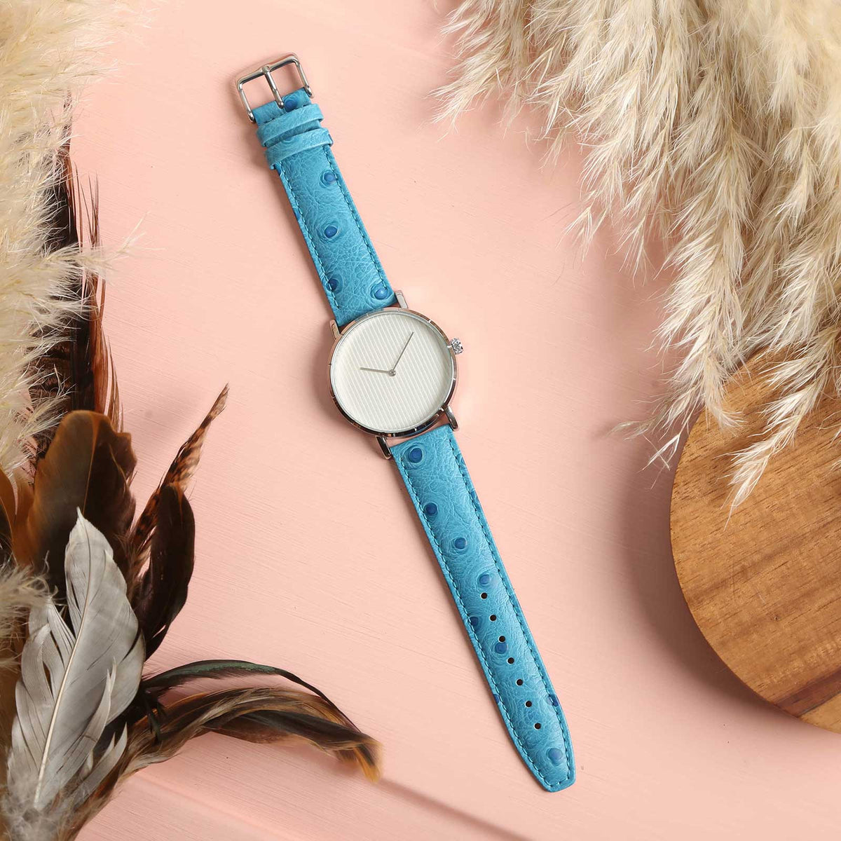 Sandbanks Ostrich Light Blue Watch Strap, shown on a watch