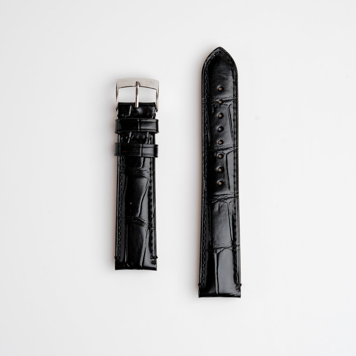 Morellato tiepolo black alligator grain embossed leather watch strap with a silver buckle, displayed flat on a white background.