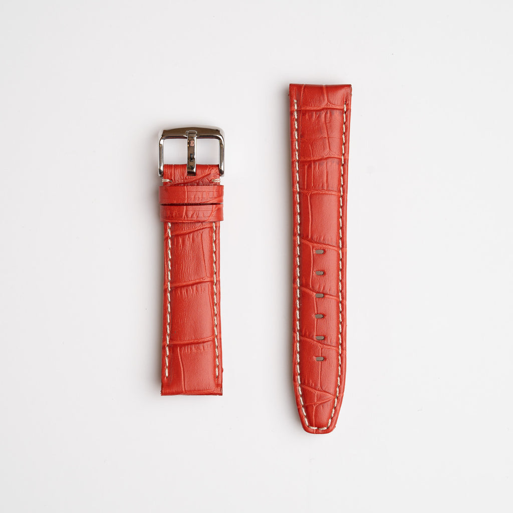 Red Mayfair Alligator watch strap, laid flat with its buckle