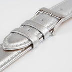 Metallic Silver Watch Strap, close-up of the buckle and keepers