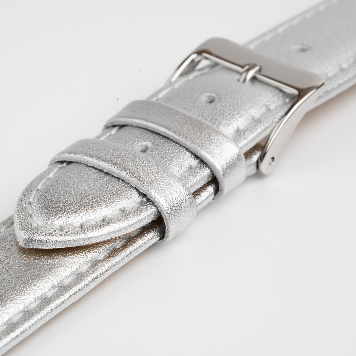Metallic Silver Watch Strap, close-up of the buckle and keepers