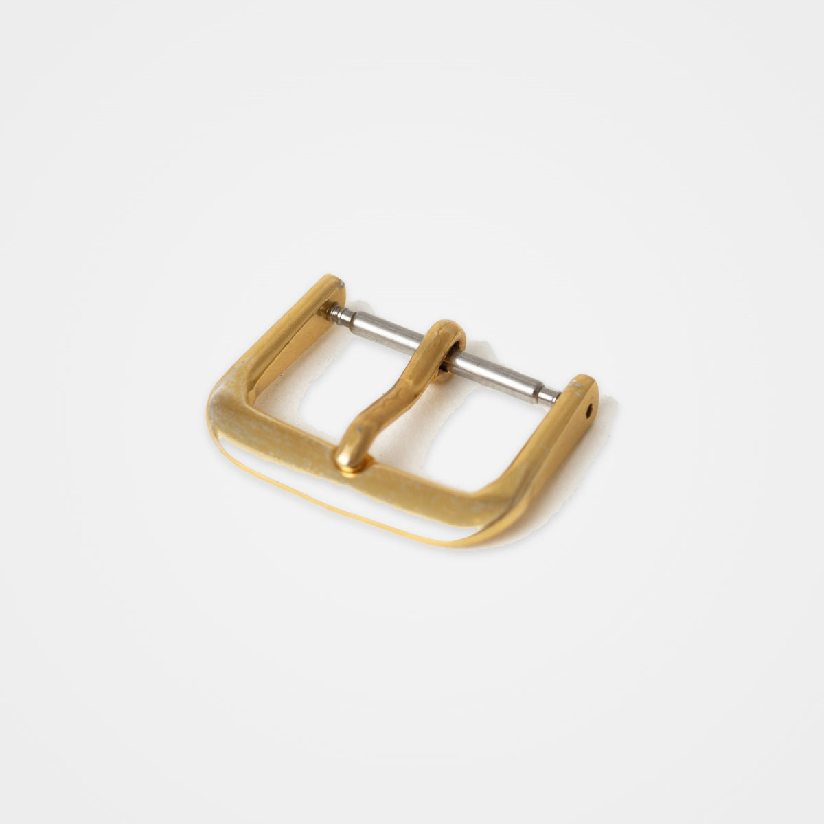 Standard gold-tone watch strap buckle
