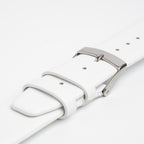 Apple Fibre White Watch Strap, close-up of the buckle and keepers