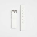 A white silicone watch strap with a silver buckle on a light background.